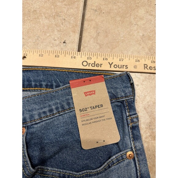 LEVIS Jeans Mens 34x32 502 Regular Taper Stretch Blue Denim Sits below Waist NEW - Picture 5 of 9